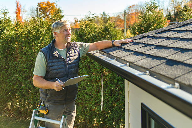 Professional Roof Replacement technician working in Clinton, MS